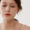 Handshaped Earrings with Organic Pearls - Image 5
