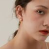 Handshaped Earrings with Organic Pearls - Image 2
