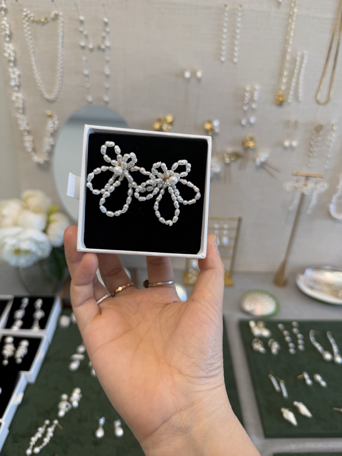 Pearl earrings presented in a box at the CHEZ LOLA Oslo studio